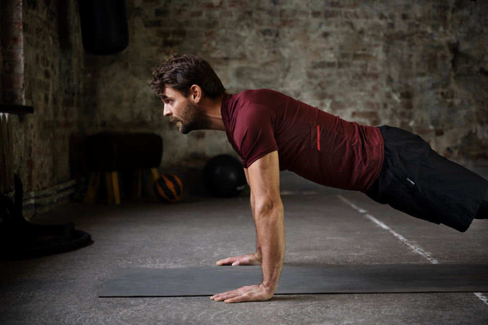 A man that does push-ups as a mart of his extreme weight loss workout